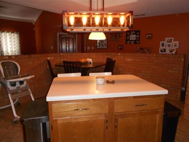 THIS IS THE VIEW OF THE FRONT DOOR FROM THE KITCHE