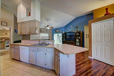 Kitchen opens to Living Area