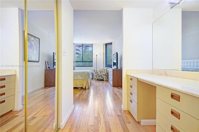 Master bedroom with Ddesk and walk-in closet