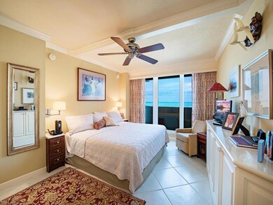 Bedroom with ceiling fan, access to exterior, orna