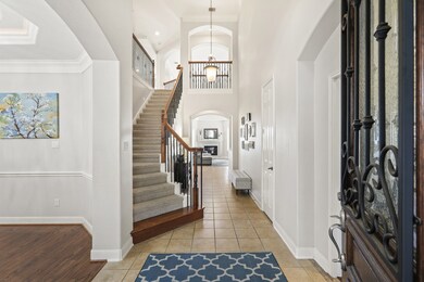 2 story entry way with formal dining to the left a