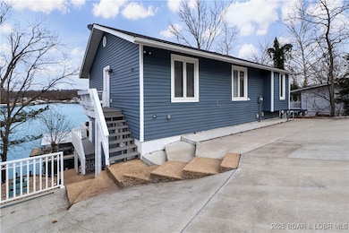 Large concrete parking area for guests! Dual entra