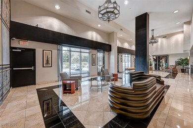 Common area featuring recessed lighting and a high ceiling