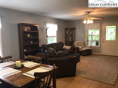 Dining into living space with acesss to front , co