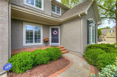 spacious front, brick paver porch.