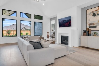 Family room with a vaulted ceiling, plus a direct