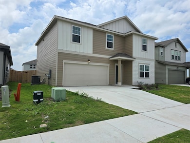 View of front of property featuring board and bat