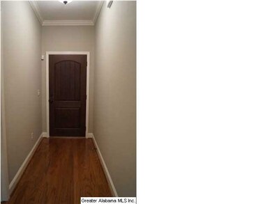 Entry foyer with hardwood floors