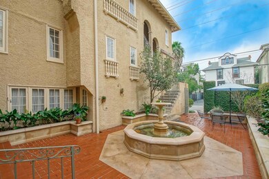 Pretty fountain w/ view of access to Apt A & B