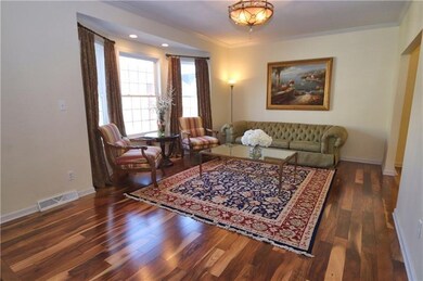 Hardwood continues thru the formal Living Room wit