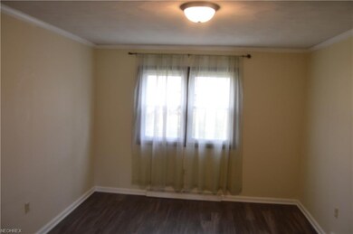 Dining room with laminate flooring.