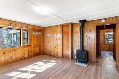 Living Room/ Dining room including a Wall Furnace 
