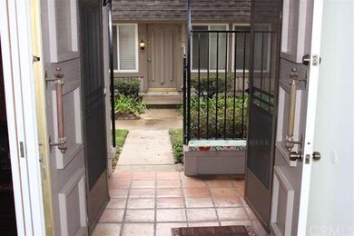 Small sitting porch off the front door and family 