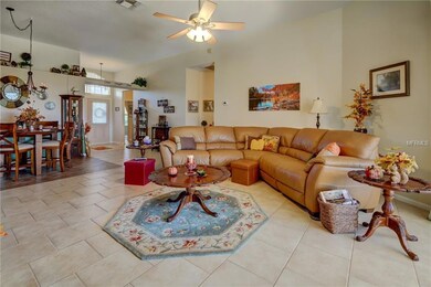 View of living room, dining area and foyer.