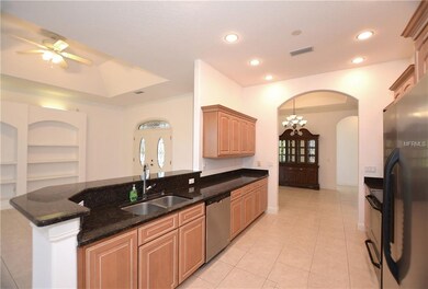 Open to the living space, the kitchen offers wood 