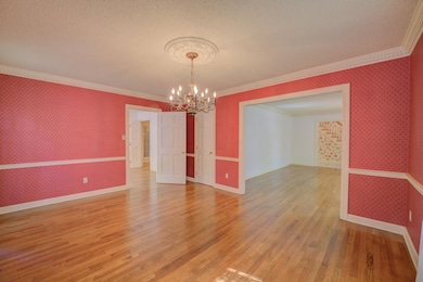 Formal Dining Room with beautiful wallpaper, denti