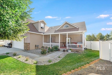 View of front of house with a shingled roof, a porch, stone siding, driveway, and an attached garage