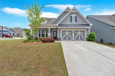 Craftsman-style house with board and batten siding