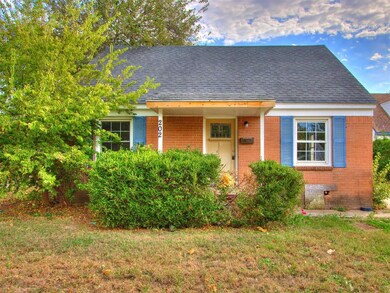 View of front of house with a front yard