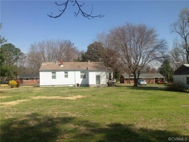 Rear View of the house with large yard and great g