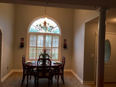 DINING ROOM VIEW FROM GREAT ROOM, PALADIUM WINDOW