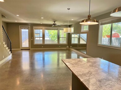 Kitchen featuring recessed lighting, ceiling fan,
