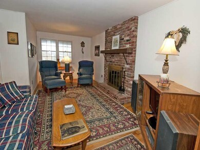 Family Room. The wood burning fireplace with gas i