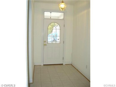 Entry foyer with ceramic tile floor