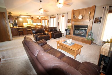 This room features a wood burning fireplace with a