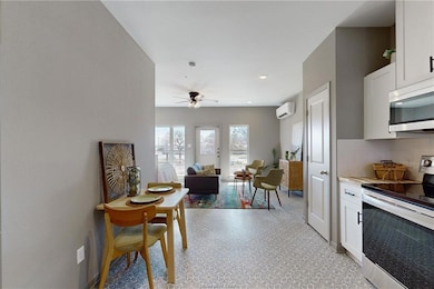 Kitchen with appliances with stainless steel finis