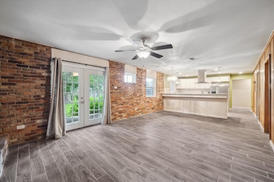Double doors lead to the backyard.