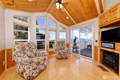 Living area with fireplace and loads of light