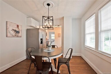 Family room flows to the dining area and into the kitchen - very nice layout!