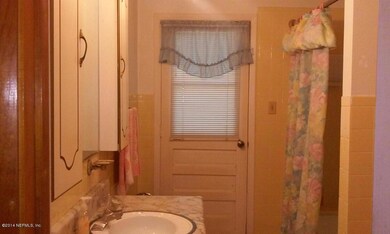 Bath with outside door