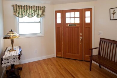 The bright foyer welcomes your guests.