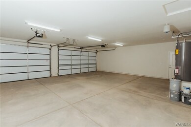 Garage featuring water heater