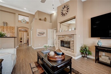 STONE ACCENTED FIREPLACE KEEPS IT COZY, PARTITION