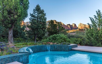 Pool water feature and red rock view