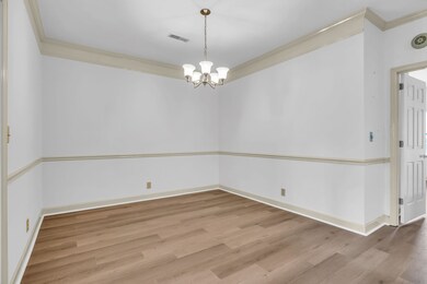 The large Dining Room has beautiful mouldings and could be used as an office or any way that meets your needs.