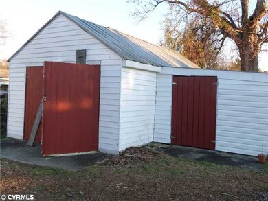 Other - Detached garage with cement floor and attached storage building