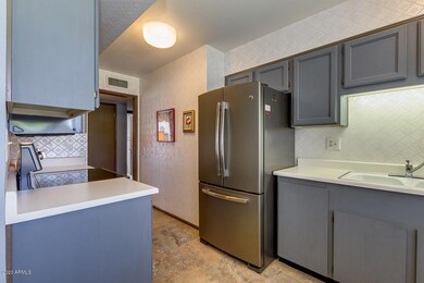 9862 W Country Club Ct, Sun City, AZ 85373 - photo 6