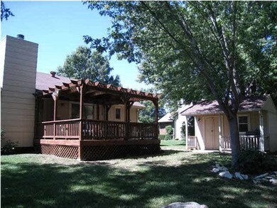 Relax and enjoy the breeze on the covered deck in 