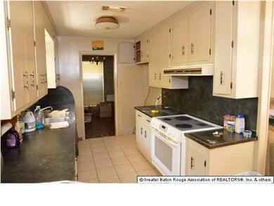 Galley kitchen with lots of cabinets