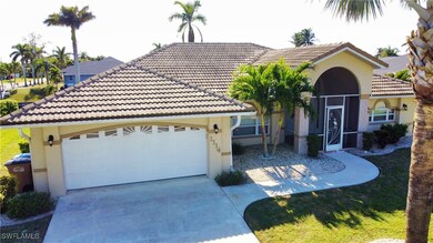 Mediterranean / spanish-style house with a garage