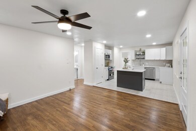 Kitchen with appliances with stainless steel finis