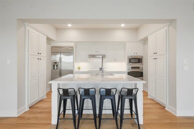 Centrally located is the magnificent kitchen with