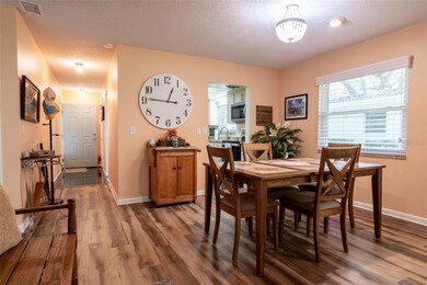 Dining room open to the living room and the bonus room