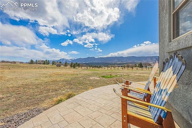 View of spacious swim spa with cover to provide protection from the Colorado sun.