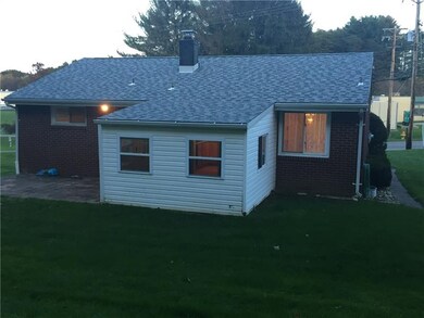 Back View Of Home,3 Season Room New Roof