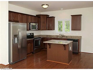 Kitchen - Picture is from same floor plan in neigh